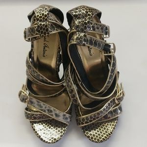 Micheal Antonio Gold And Black Heels